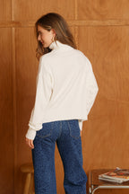 Pull col roulé