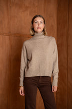 Pull col roulé