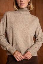 Pull col roulé