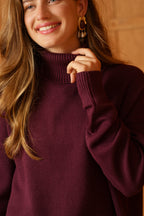 Pull col roulé