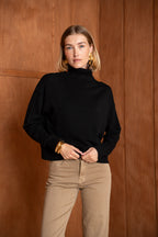 Pull col roulé