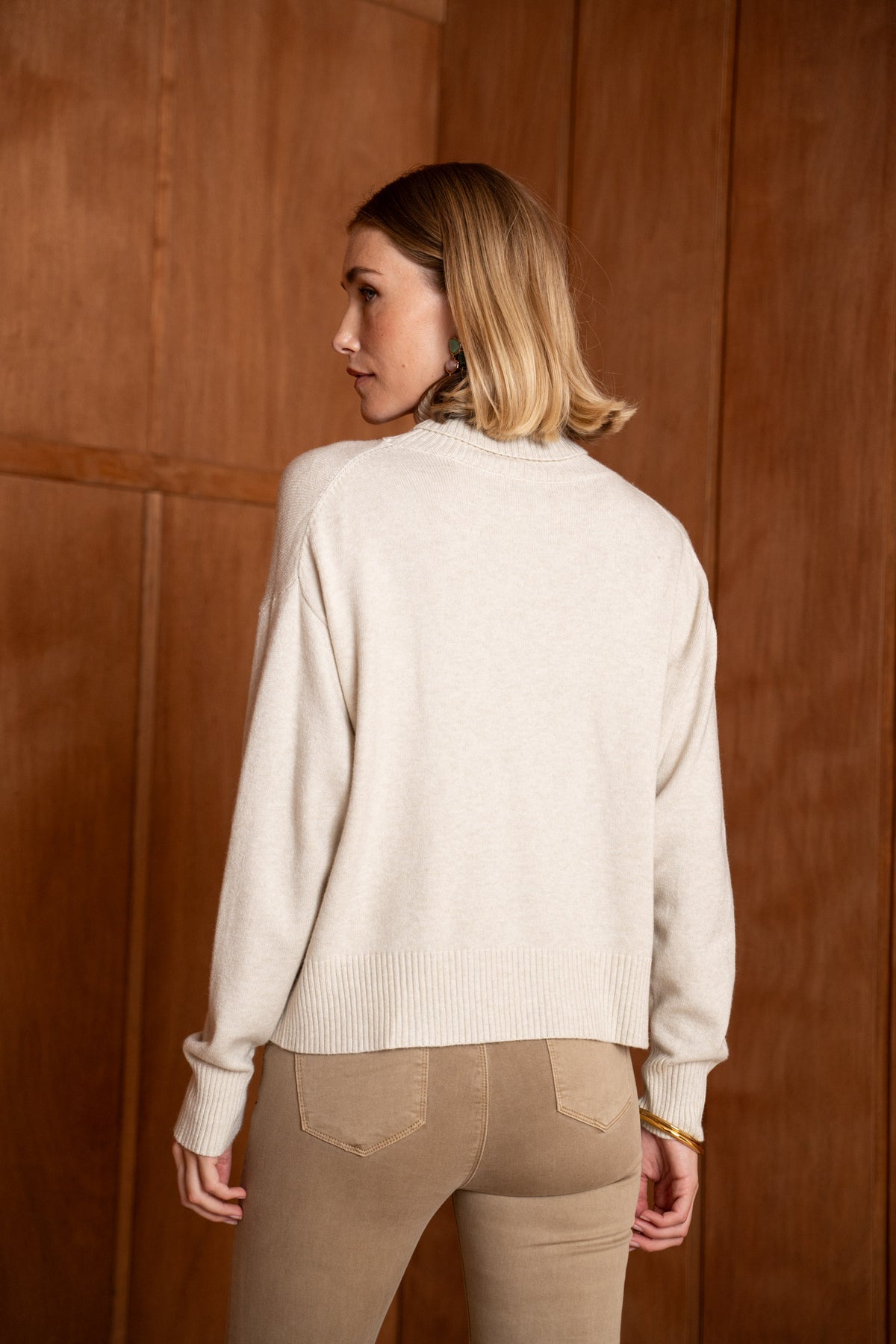 Pull col roulé