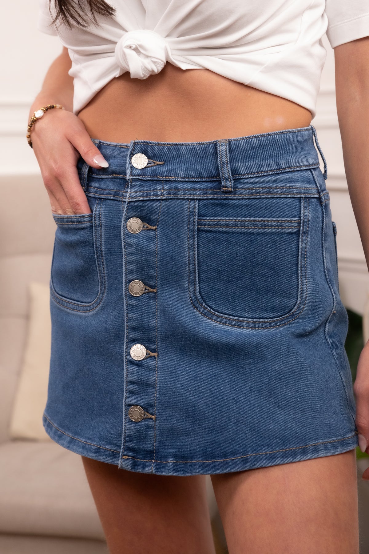 Jupe short en jean boutonnée poche plaquée avant