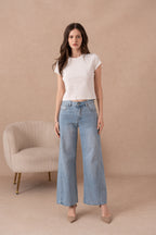 Jean large avec couture côté