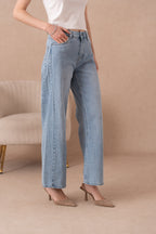 Jean large avec couture côté
