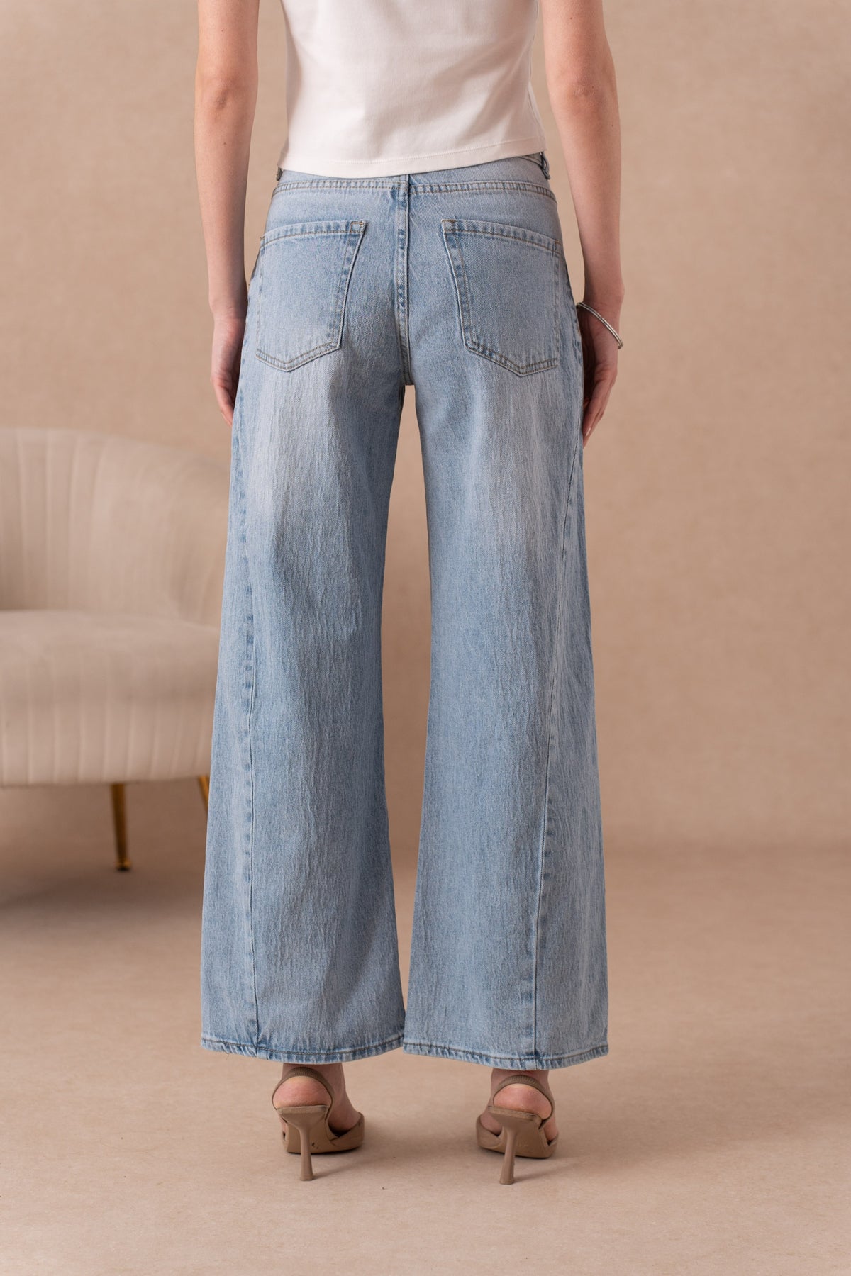 Jean large avec couture côté